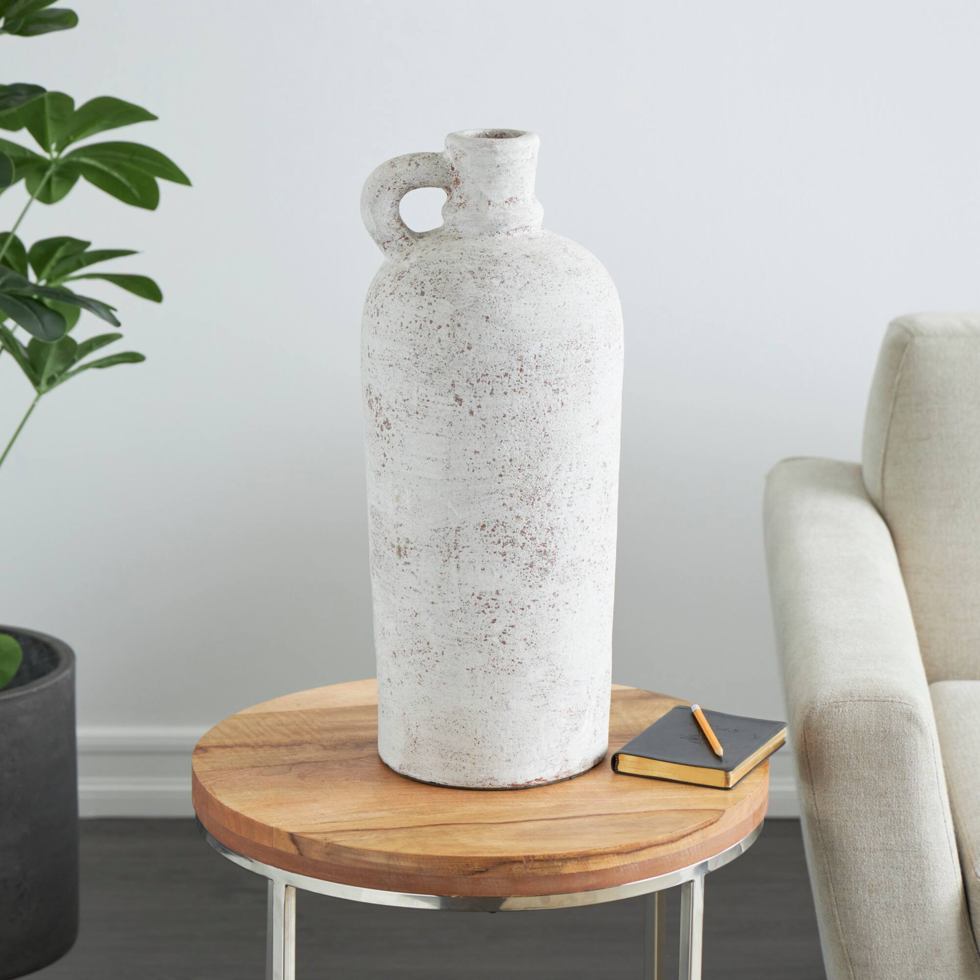 22" Cream Ceramic Antique Style Textured Vase with Curved Handle
